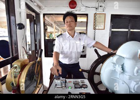 (170623) -- HONG KONG, June 23, 2017 -- The captain sails the Star Ferry on the route linking Wan Chai and Tsim Sha Tsui in Hong Kong, south China, June 13, 2017. July 1, 2017 marks the 20th anniversary of Hong Kong s return to the motherland. ) (ry) CHINA-HONG KONG-RETURN ANNIVERSARY-STAR FERRY (CN) WangxXi PUBLICATIONxNOTxINxCHN   Hong Kong June 23 2017 The Captain SAILS The Star Ferry ON The Route Linking Wan Chai and Tsim Sha Tsui in Hong Kong South China June 13 2017 July 1 2017 Marks The 20th Anniversary of Hong Kong S Return to The Motherland Ry China Hong Kong Return Anniversary Star F Stock Photo