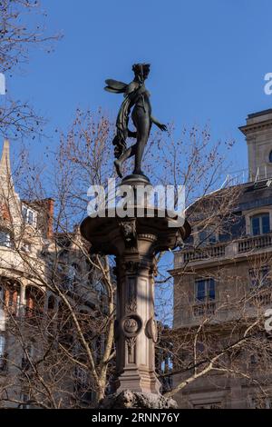 River Nymph scultpure on top of a fountain at Andre Malraux Square in Paris, France. Stock Photo