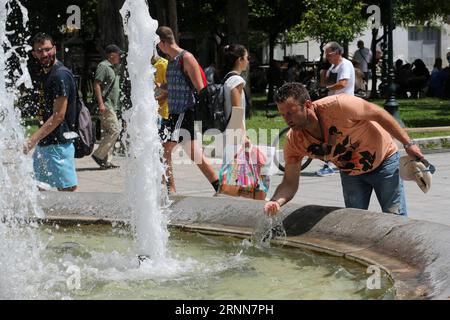 (170629) -- ATHENS, June 29, 2017 -- People cool themselves down in Athens, Greece, on June 29, 2017 as temperature rises up to about 40 degrees Celsius. ) GREECE-ATHENS-HEAT WAVE MariosxLolos PUBLICATIONxNOTxINxCHN   Athens June 29 2017 Celebrities cool themselves Down in Athens Greece ON June 29 2017 As temperature Rises up to About 40 Degrees Celsius Greece Athens Heat Wave MariosxLolos PUBLICATIONxNOTxINxCHN Stock Photo