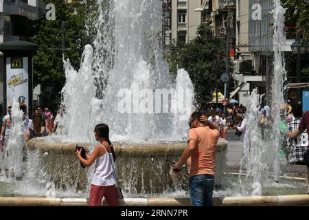 (170629) -- ATHENS, June 29, 2017 -- People cool themselves down in Athens, Greece, on June 29, 2017 as temperature rises up to about 40 degrees Celsius. ) GREECE-ATHENS-HEAT WAVE MariosxLolos PUBLICATIONxNOTxINxCHN   Athens June 29 2017 Celebrities cool themselves Down in Athens Greece ON June 29 2017 As temperature Rises up to About 40 Degrees Celsius Greece Athens Heat Wave MariosxLolos PUBLICATIONxNOTxINxCHN Stock Photo