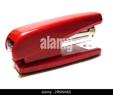 Red stapler isolated on the white background Stock Photo