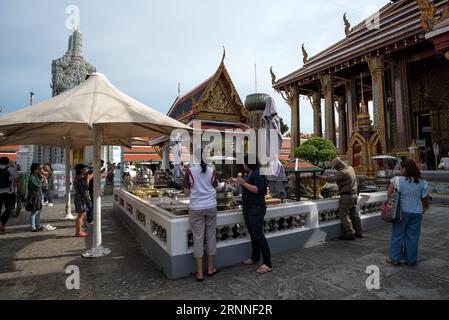 Bangkok, Thailand - Jun 1, 2019: Buddhism culture activities in The Grand Place, Bangkok, Thailand - The atmosphere and visitors in the Grand Palace t Stock Photo