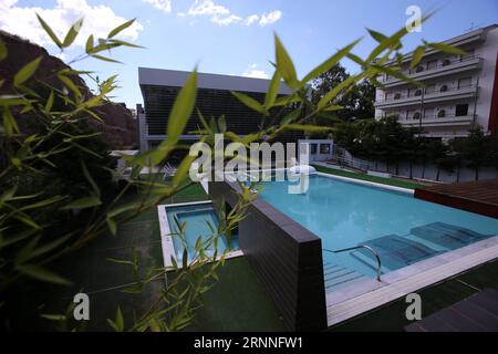 (170712) -- LOUTRAKI (GREECE), July 12, 2017 -- Photo taken on June 19, 2017 shows the modern facilities of Loutraki Thermal Spa at the seaside resort of Loutraki, 80 km southwest of Athens, capital of Greece. A breath away from Athens, the seaside resort of Loutraki on the Gulf of Corinth has been for several decades a popular holiday destination for those seeking to take a dive in history, the sea and the therapeutic waters of the natural thermal springs at the foot of Geraneia mountain range. Amid the acute debt crisis that has hit Greece since 2009, local authorities in this town of 20,000 Stock Photo