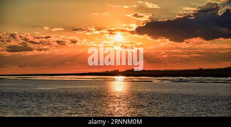 sunset over Cobequid Bay, inlet of the Bay of Fundy and the easternmost part of the Minas Basin, located in the Canadian province of Nova Scotia Stock Photo