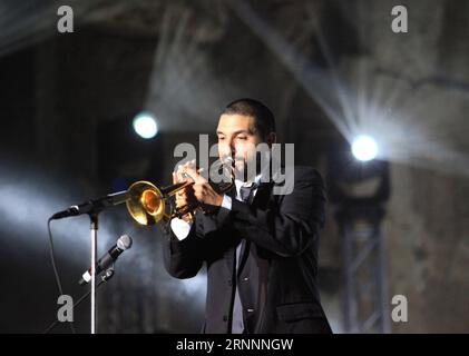 (170723) -- BAALBECK, July 23, 2017 () -- Trumpet player and composer Ibrahim Maalouf performs during the Baalbeck International Festival in Baalbeck, Lebanon, July 22, 2017.() (djj) LEBANON-BAALBECK-INTERNATIONAL FESTIVAL-IBRAHIM MAALOUF Xinhua PUBLICATIONxNOTxINxCHN   Baalbeck July 23 2017 Trumpet Player and Composer Ibrahim Maalouf performs during The Baalbeck International Festival in Baalbeck Lebanon July 22 2017 djj Lebanon Baalbeck International Festival Ibrahim Maalouf XINHUA PUBLICATIONxNOTxINxCHN Stock Photo