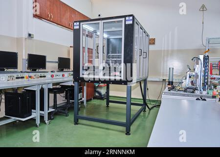 Big 3d printing machine in a workshop. 3D printing machine on a stand Stock Photo