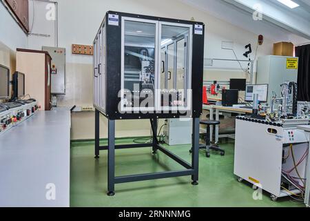 Big 3d printing machine in a workshop. 3D printing machine on a stand Stock Photo