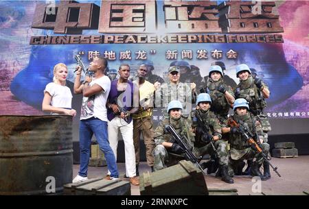 (170801) -- BEIJING, Aug. 1, 2017 -- Cast members of film Chinese Peacekeeping Forces take a photo during a press conference in Beijing, capital of China, July 31, 2017. The film tells the heroic stories of Chinese peacekeepers in Africa. China has been a staunch supporter of and an active participant in United Nations peacekeeping operations. It s the largest troop-contributor among the permanent members of the Security Council and second largest contributor to the peacekeeping budget. ) (lx) CHINA-BEIJING-FILM-PRESS CONFERENCE(CN) JinxLiangkuai PUBLICATIONxNOTxINxCHN   Beijing Aug 1 2017 Cas Stock Photo