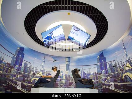 (170801) -- HOHHOT, Aug. 1, 2017 -- People experience VR(Visual Reality) glasses at Isoftstone big data industry center in Yuquan District of Hohhot, capital of north China s Inner Mongolia Autonomous Region, Aug. 1, 2017. Isoftstone big data industry center was put into operation on Tuesday in Yuquan District to promote the construction of Smart City and Smart tourism . ) (xzy) CHINA-HOHHOT-BIG DATA-INDUSTRY BASE (CN) DingxGenhou PUBLICATIONxNOTxINxCHN   Hohhot Aug 1 2017 Celebrities Experience VR Visual Reality Glasses AT  Big Data Industry Center in Yuquan District of Hohhot Capital of Nort Stock Photo