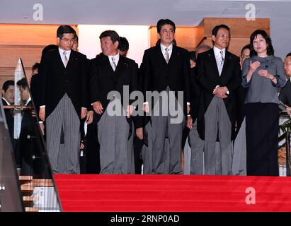 (170803) -- TOKYO, Aug. 3, 2017 -- Japanese Prime Minister Shinzo Abe (front C) prepares for a photo session with his cabinet ministers at Abe s official residence in Tokyo, Japan, Aug. 3, 2017. Japanese Prime Minister Shinzo Abe reshuffled his cabinet and the ruling Liberal Democratic Party s (LDP) executive lineup on Thursday in a bid to restore public faith in a scandal-mired government. ) (djj) JAPAN-TOKYO-CABINET-RESHUFFLE MaxPing PUBLICATIONxNOTxINxCHN   Tokyo Aug 3 2017 Japanese Prime Ministers Shinzo ABE Front C Prepares for a Photo Session With His Cabinet Minister AT ABE S Official R Stock Photo