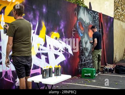 Graffiti artists creating street art pieces at the at the Southend City Jam 2023, Essex © Clarissa Debenham (Film Free Photography) / Alamy Stock Photo