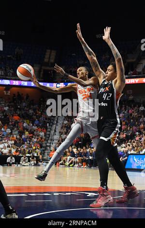 August 31, 2023: Connecticut Sun forward DeWanna Bonner (24) passes the ball while defended by Phoenix Mercury center Brittney Griner (42) during a WNBA game between the Phoenix Mercury and the Connecticut Sun at Mohegan Sun Arena in Uncasville, Connecticut. Erica Denhoff/CSM Stock Photo