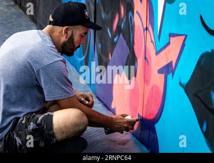 Graffiti artists creating street art pieces at the at the Southend City Jam 2023, Essex © Clarissa Debenham (Film Free Photography) / Alamy Stock Photo