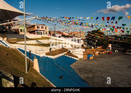 The blue staircase, in the square decorated with colorful flags, of the São Pedro chapel, in the Madre Deus neighborhood, São Luís, Maranhão, Brazil Stock Photo