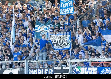 Wiesbaden, Germany. 02nd Sep, 2023. Soccer: 2nd Bundesliga, Matchday 5, SV Wehen Wiesbaden - FC Schalke 04 at the BRITA Arena. Jubilant Schalke fans. Credit: Jürgen Kessler/dpa - IMPORTANT NOTE: In accordance with the requirements of the DFL Deutsche Fußball Liga and the DFB Deutscher Fußball-Bund, it is prohibited to use or have used photographs taken in the stadium and/or of the match in the form of sequence pictures and/or video-like photo series./dpa/Alamy Live News Stock Photo