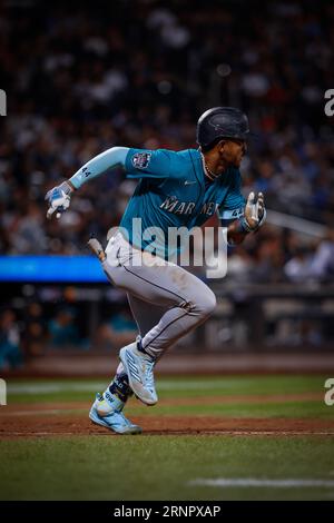 Sep 01, 2023; New York City, New York, USA; Seattle Mariners center fielder Julio Rodriguez (44) hits a double to center field in the eighth inning against the New York Mets at Citi Field. (Ariel Fox/Image of Sport) Stock Photo