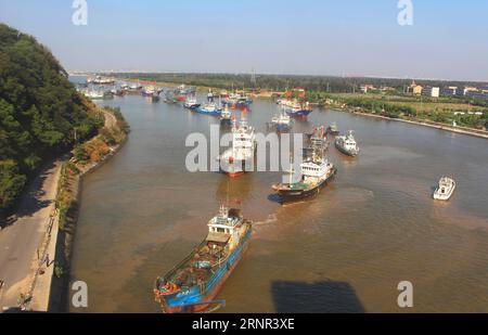 (170917) -- TAIZHOU, Sept. 17, 2017 -- Fishing boats put out to sea at a port in Taizhou, east China s Zhejiang Province, Sept. 17, 2017. The annual summer fishing ban, which was enforced on May 1 in the East China Sea, was scheduled to end on Friday. But Typhoon Talim delayed the start of fishing to Saturday for local fishermen.)(wjq) CHINA-ZHEJIANG-TYPHOON TALIM-AFTERMATH (CN) LiangxMinhui PUBLICATIONxNOTxINxCHN