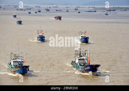 (170917) -- ZHOUSHAN, Sept. 17, 2017 -- Fishing boats put out to sea in Zhoushan, east China s Zhejiang Province, Sept. 17, 2017. The annual summer fishing ban, which was enforced on May 1 in the East China Sea, was scheduled to end on Friday. But Typhoon Talim delayed the start of fishing to Saturday for local fishermen. )(wjq) CHINA-ZHEJIANG-TYPHOON TALIM-AFTERMATH (CN) HuxSheyou PUBLICATIONxNOTxINxCHN
