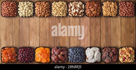 nuts and dried fruit with copy space table. healthy snacks on top, food background. Stock Photo