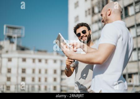 Successful Urban Architecture Team Collaborating on Modern Building Design Outdoors Stock Photo
