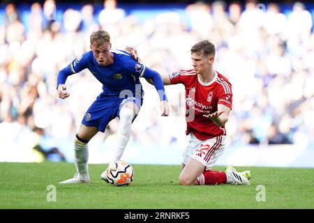 Chelsea's Cole Palmer and Nottingham Forest's Ryan Yates battle for the ball during the Premier League match at Stamford Bridge, London. Picture date: Saturday September 2, 2023. Stock Photo