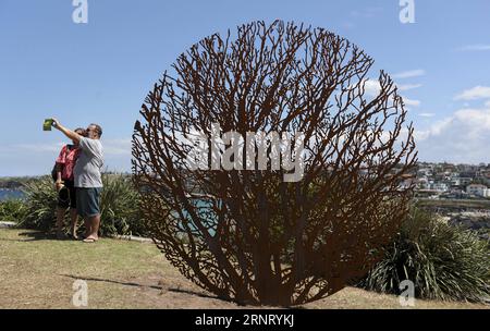 (171022) -- SYDNEY, Oct. 22, 2017 -- Visitors take selfie at the Bondi beach in Sydney, Australia, on Oct. 22, 2017. Sculpture by the Sea, Australia s famous annual outdoor art exhibition, celebrated its 21st anniversary this year. ) (swt) AUSTRALIA-SYDNEY-SCULPTURES BaixXuefei PUBLICATIONxNOTxINxCHN Stock Photo