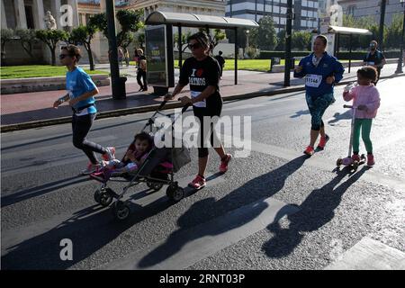 (171022) -- ATHENS, Oct. 22, 2017 -- Runners participate in the 31st Race of Athens in the center of the Greek capital Athens on Oct. 22, 2017. The annual event which is organized by the municipality of Athens aims to motivate people to exercise more and have a healthier lifestyle. ) (zw) GREECE-ATHENS-RUNNING MariosxLolos PUBLICATIONxNOTxINxCHN Stock Photo