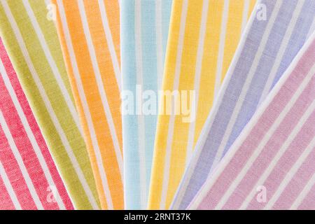 Colorful folded stripes pattern fabric background Stock Photo