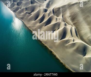 (171119) -- URUMQI, Nov. 19, 2017 -- Photo taken on Nov. 13, 2017 shows the Baisha Lake in Akto County, northwest China s Xinjiang Uygur Autonomous Region. Pamir Plateau was once a busy passage used by traders traveling along the ancient Silk Road. )(wsw) CHINA-XINJIANG-PAMIRS PLATEAU (CN) ShenxBohan PUBLICATIONxNOTxINxCHN Stock Photo