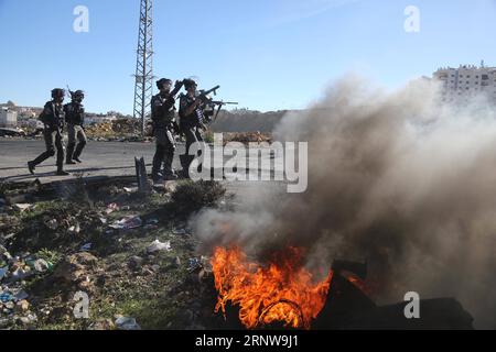 (171209) -- RAMALLAH, Dec. 9, 2017 -- Clashes break out between Palestinian protesters and Israeli soldiers after a protest against U.S. President Donald Trump s decision to recognize Jerusalem as the capital of Israel, near the West Bank city of Ramallah on Dec. 9, 2017. ) (zy) MIDEAST-RAMALLAH-CLASHES Stringer PUBLICATIONxNOTxINxCHN Stock Photo