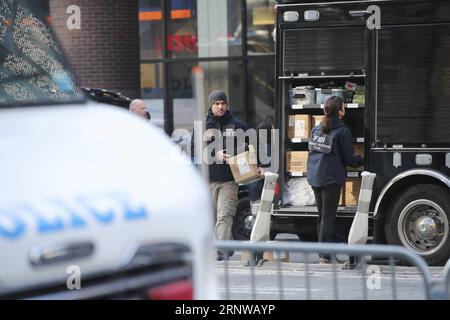 (171211) -- NEW YORK, Dec. 11, 2017 -- FBI evidence response team members work near the scene of an explosion in New York City, the United States, on Dec. 11, 2017. Four people were injured in an explosion in a passageway near Times Square, Manhattan in New York City early Monday morning. ) U.S.-NEW YORK CITY-BLAST WangxYing PUBLICATIONxNOTxINxCHN Stock Photo