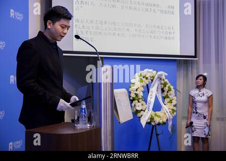 (171212) -- THE HAGUE, Dec. 12, 2017 -- A representative of Chinese students in the Netherlands addresses a memorial of Nanjing Massacre in The Hague, the Netherlands, on Dec. 12, 2017. Some 200 Chinese people and students living in the Netherlands attended a memorial of Nanjing Massacre, held one day ahead of China s National Memorial Day for Nanjing Massacre Victims. ) THE NETHERLANDS-THE HAGUE-NANJING MASSACRE-MEMORIAL RickxNederstigt PUBLICATIONxNOTxINxCHN Stock Photo