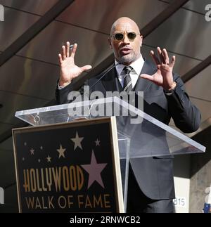 (171214) -- LOS ANGELES, Dec. 14, 2017 -- Dwayne Johnson speaks at his Hollywood Walk of Fame Star ceremony in Los Angeles, the United States, Dec. 13, 2017. Dwayne Johnson was honored with a star on the Hollywood Walk of Fame on Monday. ) (djj) U.S.-LOS ANGELES-HOLLYWOOD WALK OF FAME-DWAYNE JOHNSON LixYing PUBLICATIONxNOTxINxCHN Stock Photo