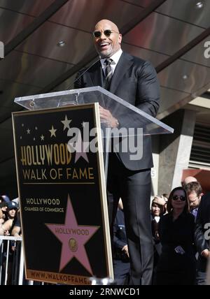 (171214) -- LOS ANGELES, Dec. 14, 2017 -- Dwayne Johnson speaks at his Hollywood Walk of Fame Star ceremony in Los Angeles, the United States, Dec. 13, 2017. Dwayne Johnson was honored with a star on the Hollywood Walk of Fame on Monday. ) (djj) U.S.-LOS ANGELES-HOLLYWOOD WALK OF FAME-DWAYNE JOHNSON LixYing PUBLICATIONxNOTxINxCHN Stock Photo