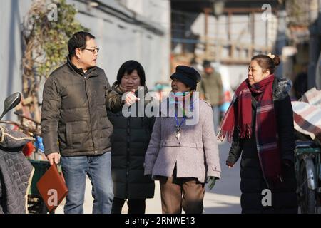 (171216) -- BEIJING, Dec. 16, 2017 -- Liu Yueming (1st L) inspects a street with residents in the Dongcheng District of Beijing, capital of China, Dec. 13, 2017. Liu is one of the street chiefs appointed by the local government to manage the enviroment and order of streets. ) (zkr) CHINA-BEIJING-STREET CHIEFS(CN) JuxHuanzong PUBLICATIONxNOTxINxCHN Stock Photo