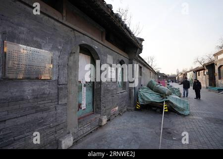 (171216) -- BEIJING, Dec. 16, 2017 -- Gao Bo (L) checks the environment of Dazhiqiao Hutong in the Xicheng District of Beijing, capital of China, Dec. 13, 2017. Gao is one of the street chiefs appointed by the local government to manage the enviroment and order of streets. ) (zkr) CHINA-BEIJING-STREET CHIEFS(CN) JuxHuanzong PUBLICATIONxNOTxINxCHN Stock Photo