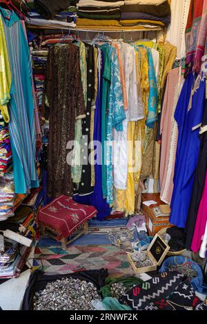 Marrakech, Morocco - Feb 10, 2023: Colourful long ladies dresses for sale in the Marrakech Souk markets Stock Photo