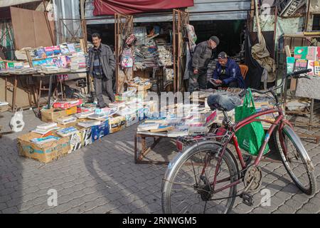 Marrakech, Morocco - Feb 8, 2023: A second hand bookstore along the Marrakech Medina city walls Stock Photo