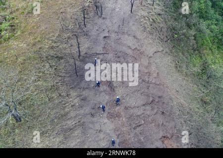 (171223) -- JINGXI, Dec. 23, 2017 -- Chinese soldiers conduct demining mission in the Guangxi section along the China-Vietnam border in south China s Guangxi Zhuang Autonomous Region, Dec. 22, 2017. Chinese soldiers began their new landmine-sweeping mission along the China-Vietnam border on Nov. 27, 2017, covering 2.05 million square meters in 53 sites close to the Guangxi border. ) (ry) CHINA-GUANGXI-VIETNAM-BORDER-DEMINING MISSION (CN) ZhouxHua PUBLICATIONxNOTxINxCHN Stock Photo