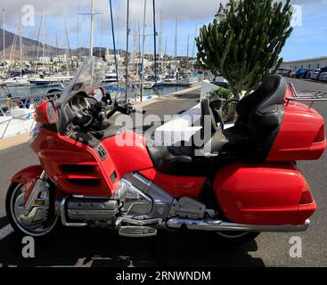 Honda Goldwing two seater motor cycle, Marina Rubicon, Playa Blanca, Lanzarote, Canary Islands, Spain. Stock Photo