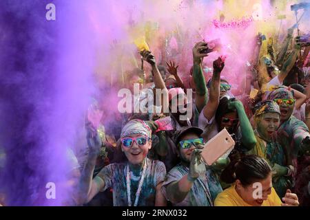 (180107) -- PASAY CITY, Jan. 7, 2018 -- Runners throw various colored powder in the air during the 2018 Color Manila Run in Pasay City, the Philippines, Jan. 7, 2018. Thousands of people participated in the fun run aiming to promote a healthier lifestyle. )(zcc) PHILIPPINES-PASAY CITY-2018 COLOR MANILA RUN RouellexUmali PUBLICATIONxNOTxINxCHN Stock Photo