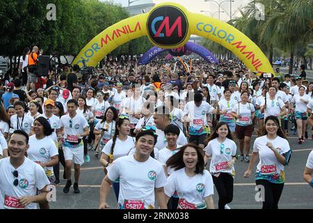 (180107) -- PASAY CITY, Jan. 7, 2018 -- Runners attend the 2018 Color Manila Run in Pasay City, the Philippines, Jan. 7, 2018. Thousands of people participated in the fun run aiming to promote a healthier lifestyle. )(zcc) PHILIPPINES-PASAY CITY-2018 COLOR MANILA RUN RouellexUmali PUBLICATIONxNOTxINxCHN Stock Photo