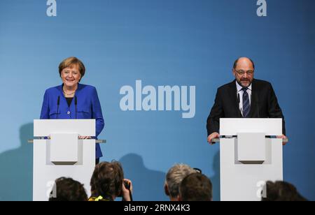 (180112) -- BERLIN, Jan. 12, 2018 -- German Chancellor and leader of German Christian Democratic Union (CDU) Angela Merkel (L) and leader of German Social Democratic Party (SPD) Martin Schulz attend a joint press conference after coalition talks at the headquarters of SPD, in Berlin, Germany, on Jan. 12, 2018. German Chancellor Angela Merkel s conservatives and the Social Democrats (SPD) on Friday achieved a breakthrough in their exploratory talks aimed at forming a new coalition government, local media reported. )(srb) GERMANY-BERLIN-COALITION TALKS-BREAKTHROUGH ShanxYuqi PUBLICATIONxNOTxINxC Stock Photo