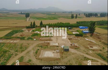 (180117) -- BEIJING, Jan. 17, 2018 -- File photo taken on June 12, 2017 shows the archaeological site in Xingtang County, north China s Hebei Province. A wagon team consisting of five chariots and 16 horses was excavated last year from a horse and chariot pit in Xingtang County, revealing the story of the Rong and Di, two major ethnic groups that emerged on what is now Chinese territory. Beside the pit, the relics that dated back from the late Spring and Autumn period (770 B.C.-476 B.C.) to the mid-Warring States period (475 B.C.-221 B.C.) included caves where the heads and hooves of a large n Stock Photo