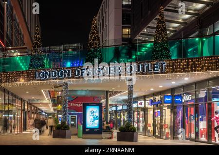 Christmas decorations at night in the London Desinger Outlet, a famous shopping district in Wembley Park on December 21, 2021 in London, United Kingdo Stock Photo