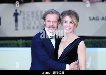 (180122) -- LOS ANGELES, Jan. 22, 2018 -- Actors Felicity Huffman and William H. Macy(L) attend the 24th annual Screen Actors Guild (SAG) Awards at the Shrine Auditorium in Los Angeles, California, the United States, Jan. 21, 2018. ) (yk) U.S.-LOS ANGELES-SAG AWARDS LixYing PUBLICATIONxNOTxINxCHN Stock Photo