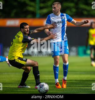 Barrow s Dean Campbell in action with Harrogate Town s Anthony O