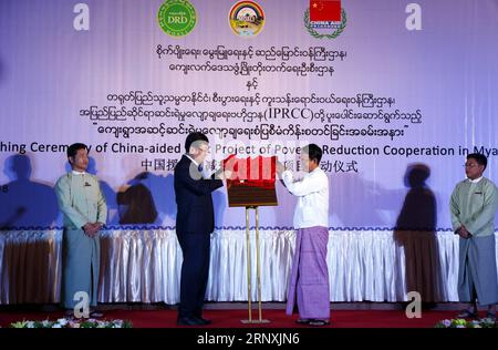 (180201) -- NAY PYI TAW, Feb. 1, 2018 -- Myanmar Minister of Agriculture, Livestock and Irrigation Aung Thu(2nd R) and Chinese Ambassador Hong Liang(2nd L) unveil during a launching ceremony of a China-aided project in Nay Pyi Taw, Myanmar, Feb. 1, 2018. A China-aided pilot project of poverty reduction was launched here on Thursday, with a view to improving the infrastructure of villages and raising the level of public services and self-development capacity in Myanmar.) (psw) MYANMAR-NAY PYI TAW-CHINA-POVERTY REDUCTION-COOPERATION UxAung PUBLICATIONxNOTxINxCHN Stock Photo