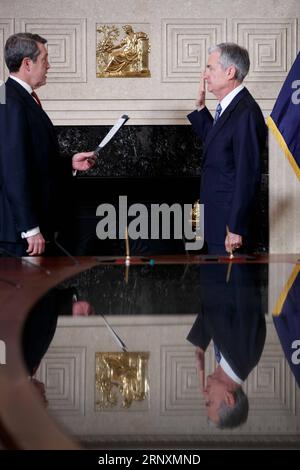 (180205) -- WASHINGTON, Feb. 5, 2018 -- Jerome Powell (R) takes the oath of office as Chairman of the U.S. Federal Reserve, succeeding Janet Yellen, in Washington, the United States. on Feb 5, 2018. ) (zf) U.S.-WASHINGTON-FEDERAL RESERVE-CHAIRMAN-JEROME POWELL TingxShen PUBLICATIONxNOTxINxCHN Stock Photo