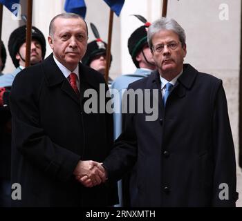 (180205) -- ROME, Feb. 5, 2018 -- Italian Prime Minister Paolo Gentiloni (R) shakes hands with visiting Turkish President Recep Tayyip Erdogan during their meeting in Rome, Italy, on Feb. 5, 2018. Turkish President Recep Tayyip Erdogan paid a 24-hour visit to the capital city and Vatican City on Monday, with a major focus on Turkey s accession to the European Union (EU) and the status of Jerusalem. ) ITALY-ROME-TURKEY-PRESIDENT-VISIT AlbertoxLingria PUBLICATIONxNOTxINxCHN Stock Photo